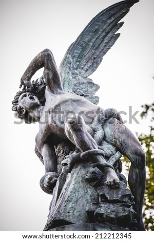 devil figure, bronze sculpture with demonic gargoyles and monsters