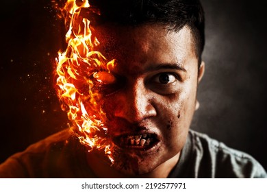 Devil Man Burning On Dark Background