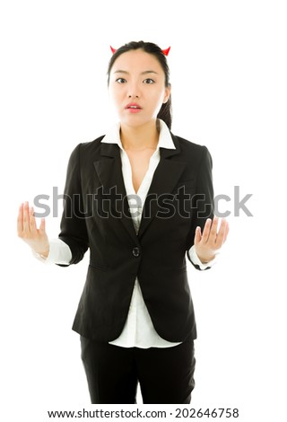Devil side of a young Asian businesswoman looking shocked isolated on white background