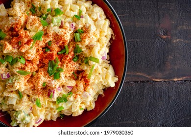 Deviled Egg Pasta Salad In A Serving Bowl: A Large Bowl Of Macaroni Salad Made With Hard-boiled Eggs