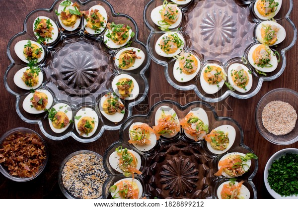 Deviled\
eggs. Devil Eggs. Thanksgiving or holiday side dish. Hard boiled\
eggs with mayo, garlic, scallions, salt and pepper. Easter dinner\
staple. Classic American appetizer favorite.\
