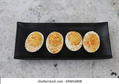 Deviled Eggs On Black Tray