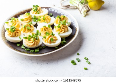 Deviled Eggs In Rustic Ceramic Plate, Easter Party Snack, Close Up