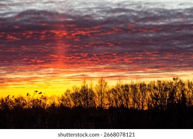 Devilish clouds at dawn. red clouds. at sunset. a natural phenomenon. landscape. screen saver