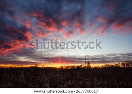 Devilish clouds at dawn. red clouds. at sunset. a natural phenomenon. landscape. screen saver