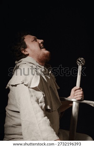 The devilish laughter of a fat, red-bearded monk with a sword in his hands.