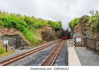 DEVIL'S BRIDGE, WALES - JULY 06, 2022: The Vale of Rheidol Railway steam engine train is waiting on the platform to take tourists on a 12 miles  scenic journey from Devil's Bridge to Aberystwyth