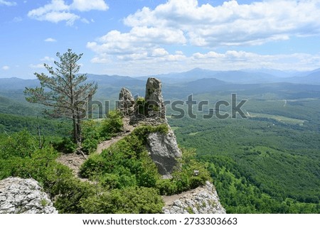 The Devil's Finger rock with a panoramic view of the Belaya River valley near the village of Dakhovskaya, Adygea Republic of Russia