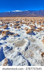 Devil's Golf Course Rugged Salt Formations and Snowcapped Mountains in Death Valley