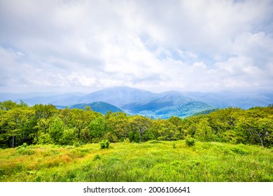 Devil's Knob Overlook Green Grass Field Meadow At Wintergreen Resort Town Village In Blue Ridge Mountains In Summer Clouds Mist Fog