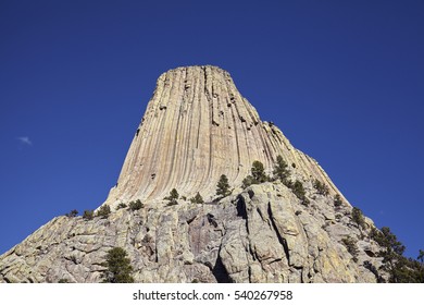 Devils Tower, A Laccolith Butte Composed Of Igneous Rock In The Bear Lodge Mountains, Top Attraction In Wyoming State, USA. 