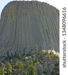 Devils Tower - A laccolithic butte composed of igneous rock in the Bear Lodge Mountains near Hulett and Sundance in Crook County, northeastern Wyoming, ...