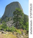 Devils Tower - A laccolithic butte composed of igneous rock in the Bear Lodge Mountains near Hulett and Sundance in Crook County, northeastern Wyoming, ...