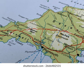 Devon, Cornwall, UK, a picture of a map in a world atlas, suitable to illustrate travel, tourism, economy and politics topics