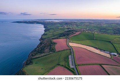 Devon Fields and Farmlands at sunset time from a drone over Shaldon and Teignmouth from Labrador Bay, Devon, England, Europe