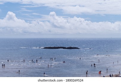 Devon / UK - AUG 18, 2020: Bigbury On Sea Beach In South Devon. People Enjoying Summer Holidays.