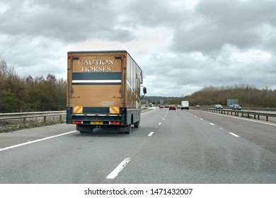 DEVON, UK. MARCH 2019. A horse truck travelling on a British motorway.