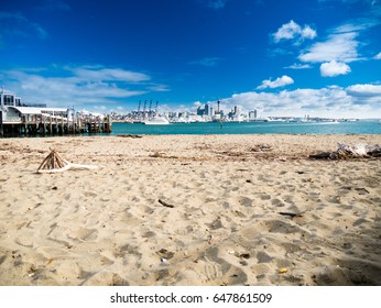 Devonport Beach With With Auckland City Background