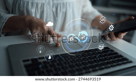 DevOps Concept with Digital Icons on Laptop Keyboard Demonstrating Continuous Integration, Cloud Computing, and Agile Workflow for Technology Professionals Quark.