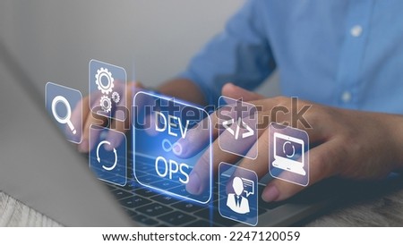 DevOps concept, software development, IT operations. Business man using laptop development with dev ops icon on computer screen, coder or sysadmin typing on keyboard, high software quality.