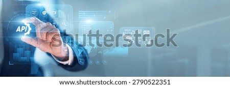 DevOps engineer hand-holds API integration points within network architectures for data exchange. Software interfaces allow different applications to communicate effectively today.