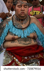 A Devotee With Magic Tatoo Getting Body Pierced With Needles During The Phuket Vegetarian Festival, Phuket Town, Thailand, On 28 September 2014