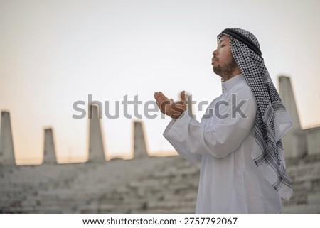 devout Muslim men making dua during outdoor prayer, hands raised in deep spiritual devotion and faith, demonstrating religious traditions and peaceful reflection in a serene setting.