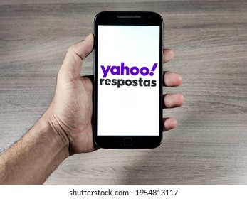 Brasília - DF, Brazil. April 12, 2021: Yahoo Answers In Portuguese On The Smartphone Screen. Yahoo Answers Is A Site Created By Yahoo! Of Questions And Answers.