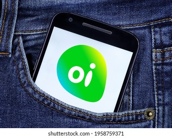 Brasília - DF, Brazil. April 19, 2021: operator Oi logo on the smartphone screen. Oi previously known as Telemar, is a telecommunications services concessionaire in Brazil.