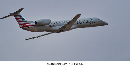 DFW Airport, Texas, December 28 2020: American Eagle Embraer 145 taking off from DFW airport