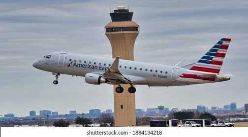 DFW Airport, Texas, December 28 2020: Embraer 175 taking off from DFW airport. 