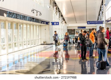 DFW, Dallas Fort Worth International Airport, Dallas, TX, USA - November 10,2014: passengers waiting for the Skylink train