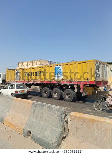A dg cement truck on road\
transporting coal / cement   - Karachi Pakistan - Sep\
2020