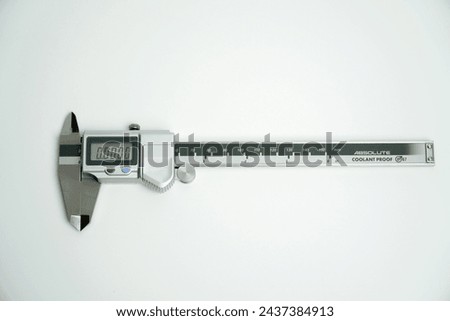 Dgital Electronic Vernier Caliper, isolated on white background,production quality control
