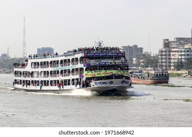 Dhaka, Bangladesh - 24th June 2017 : People returning to their village by overcrowded passenger ferry on the occasion of Eid al-Fitr