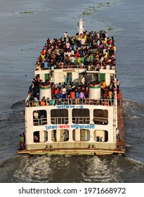 Dhaka, Bangladesh - 24th June 2017 : People returning to their home by overcrowded passenger ferry on the occasion of Eid al-Fitr