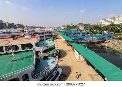 Dhaka, Bangladesh - 8th December 2021 : Sadarghat is situated on the banks of the Buriganga river. It is known as the largest and busiest river port in Bangladesh