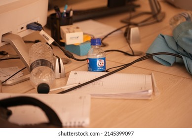 Dhaka, Bangladesh - April 13 2022: Some Water Bottles On Top Of A Wooden Work Bench 