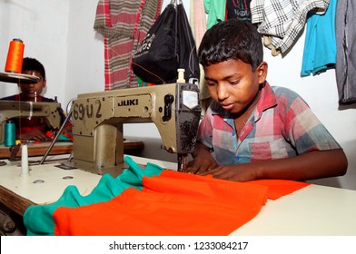 Dhaka, Bangladesh - December 08, 2014: Bangladeshi Childs Working In A Small Garment Factory At Keraniganj In Dhaka, Bangladesh On December 08, 2014.