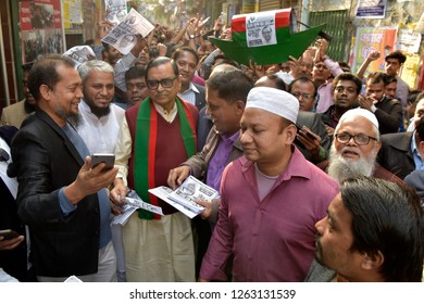 Dhaka, Bangladesh - December 20, 2018: Mohajot (Awami League) Candidate’s Rashed Khan Menon Distributing Leaflets As Part Of His Parliament Election Campaign At Dhaka-8 Constituencies At Dhaka. 