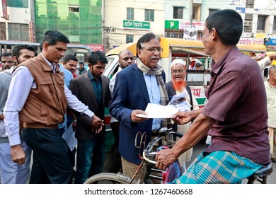 Dhaka, Bangladesh - December 26, 2018: Bangladesh Nationalist Party (BNP) Candidate’s Abdus Salam Distributing Leaflets As Part Of His Election Campaign At Dhaka-13 Constituencies At Shyamoli In Dhaka