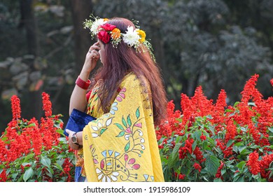 Dhaka, Bangladesh: February 13, 2021: A Girl Wearing Saree And Flower In Hair Dolled Up For Cemebrating First Day Of Spring 