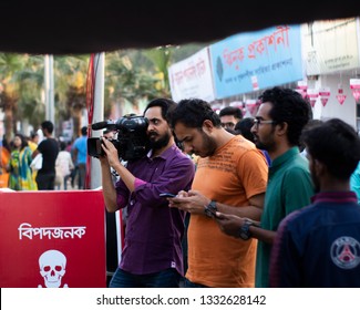 Dhaka, Bangladesh. February 20, 2019. Professional Video Camera Man Is Live Broadcasting Ekushey Book Fair.