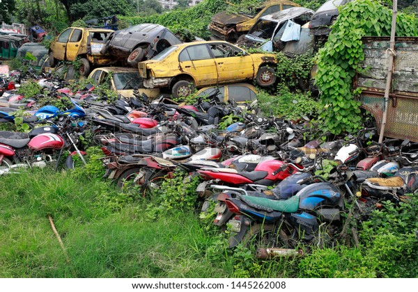 Dhaka, Bangladesh - July 06, 2019: Law enforcer\
seizes number of vehicles on various charges every day. Those cars\
remain at Agargaon in Dhaka dumping stations without proper\
maintenance for long\
time