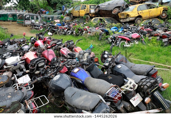 Dhaka, Bangladesh - July 06, 2019: Law enforcer\
seizes number of vehicles on various charges every day. Those cars\
remain at Agargaon in Dhaka dumping stations without proper\
maintenance for long\
time
