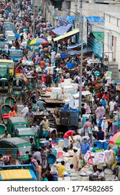 Dhaka, Bangladesh - July 10, 2020: Hundreds of People throng a Kitchen market in Kawranbazar area of Dhaka without caring for physical distancing crucial for checking coronavirus spread.