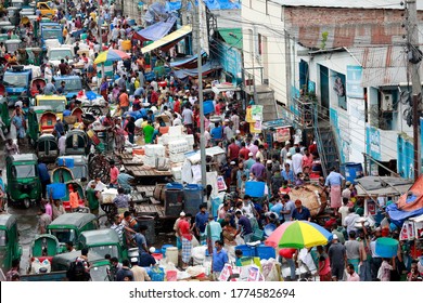 Dhaka, Bangladesh - July 10, 2020: Hundreds Of People Throng A Kitchen Market In Kawranbazar Area Of Dhaka Without Caring For Physical Distancing Crucial For Checking Coronavirus Spread.