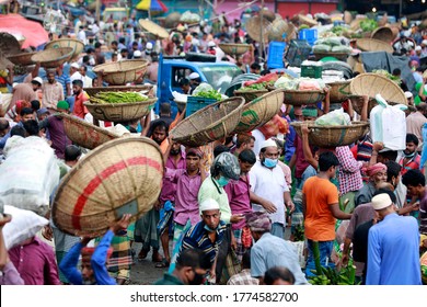 Dhaka, Bangladesh - July 10, 2020: Hundreds Of People Throng A Kitchen Market In Kawranbazar Area Of Dhaka Without Caring For Physical Distancing Crucial For Checking Coronavirus Spread.