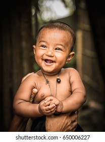 DHAKA, BANGLADESH - MAY 26, 2017: A Super Happy And Smiling South East Asian Baby