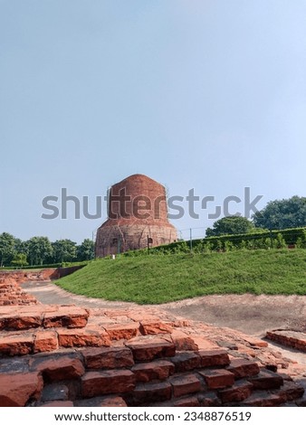 Dhamekh Stupa in Panchaytan temple ruins, Sarnath, Varanasi, India landmarks history is buddhist travel

